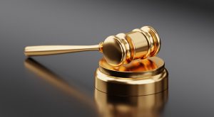 Paradise Probation Violation Defense Attorney Canva Golden Hammer and Gavel 300x165
